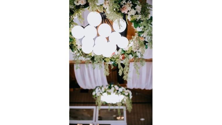 Lighted chandelier under the floral decor chandelier Accessories rental for events in Atlanta