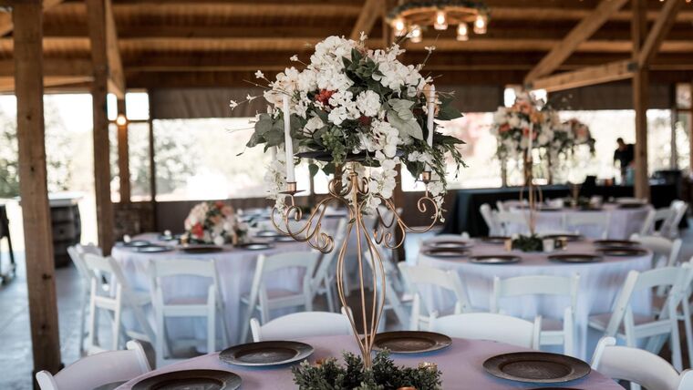 Candelabra with Floral Topper Centerpieces rental for events in Atlanta