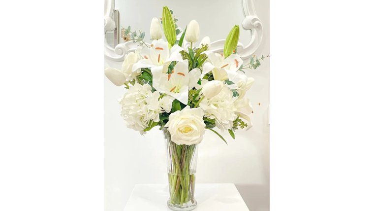 Tall Glass vase with Floral Arrangement Centerpieces rental for events in Atlanta