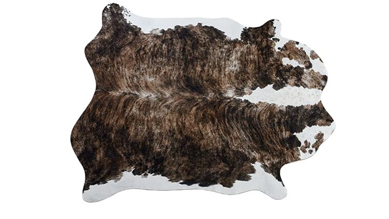Cowhide Rug Rugs rental for events in Atlanta