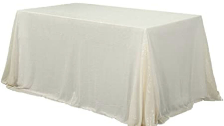 Tablecloth- 90" X 132" Rectangle Sequin Ivory Tablecloths rental for events in Atlanta