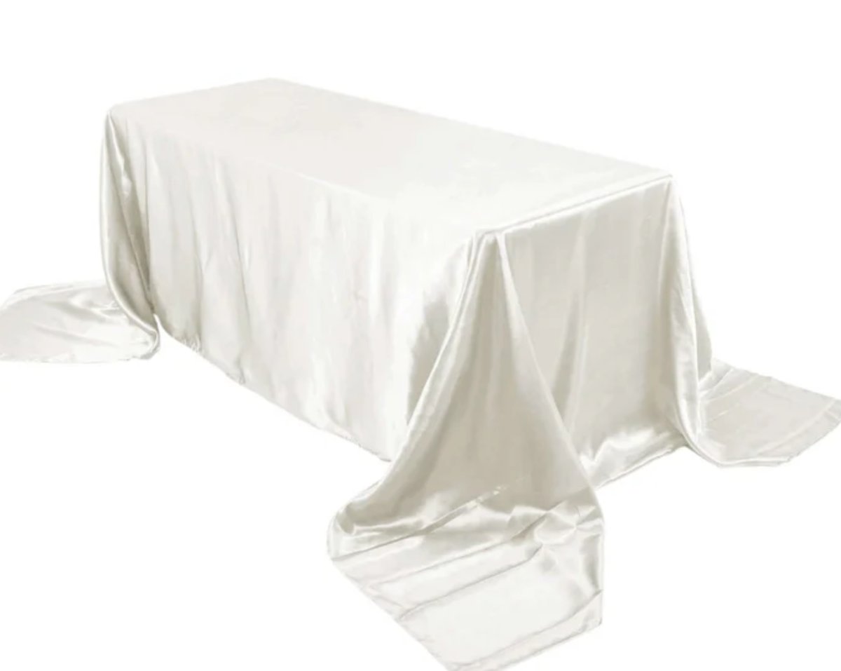 Tablecloth- 90" X 156" Rectangle Satin Ivory Tablecloths rental for events in Atlanta